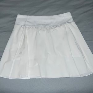 aritzia tna action tennis skirt